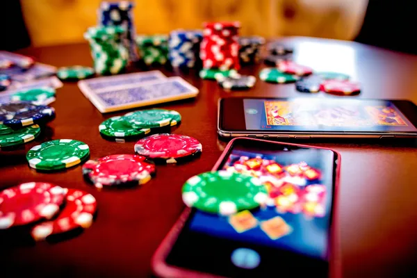 A dramatic shot of winning sevens landing on a slot reel surrounded by shining gold coins, symbolizing big wins.